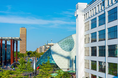 Modern buildings against blue sky