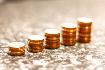 Close-up of coins on table