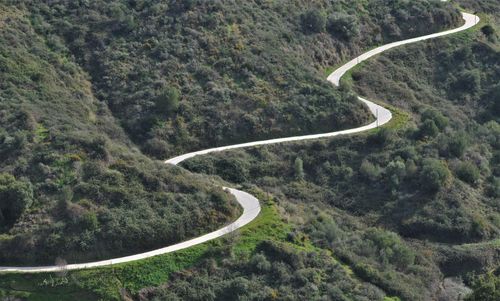 High angle view of winding road on mountain