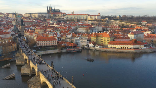 High angle view of river amidst buildings in town