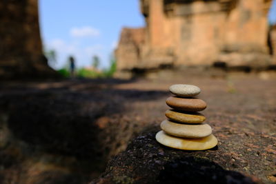 Close-up of stone stack on rock