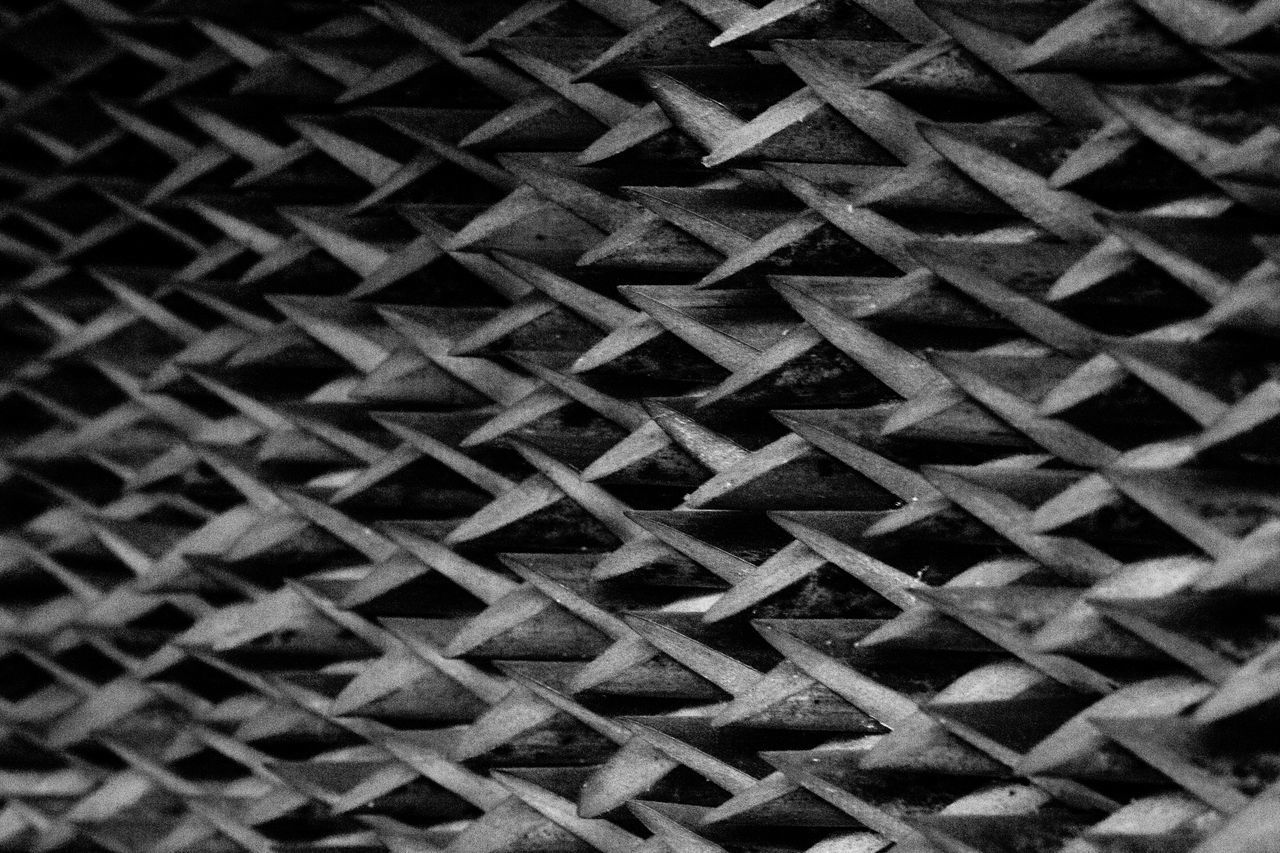 FULL FRAME SHOT OF METAL GRATE ON FLOOR