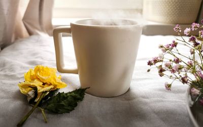 Close-up of coffee served on table