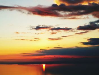 Scenic view of dramatic sky during sunset