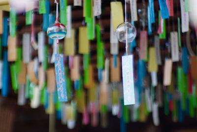 Close-up of multi colored lights hanging at shop