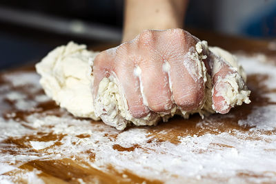 Close-up of person preparing food