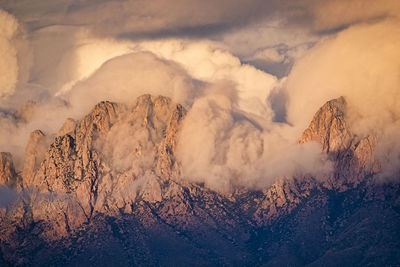 Mountains against sky during foggy weather