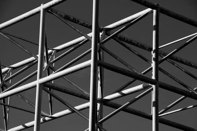 Low angle view of metallic structure against sky