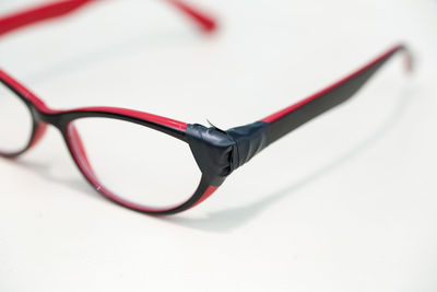 Close-up of eyeglasses on white background