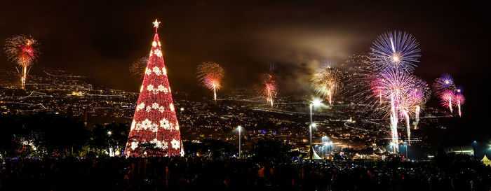 Firework display at night in city during christmas