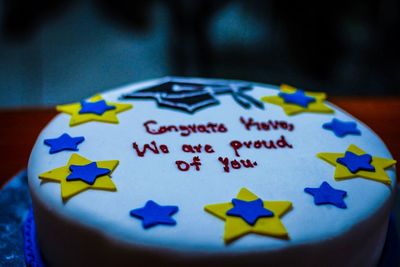 Close-up of text on cake