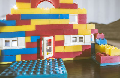 Close-up of toys on table in building