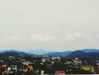 Cityscape with mountains in background