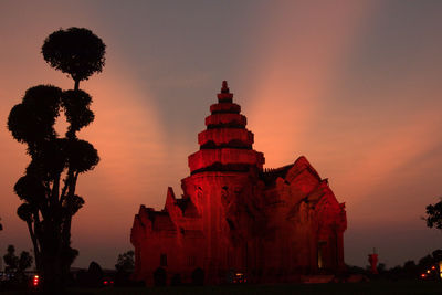 Silhouette of temple against sky during sunset