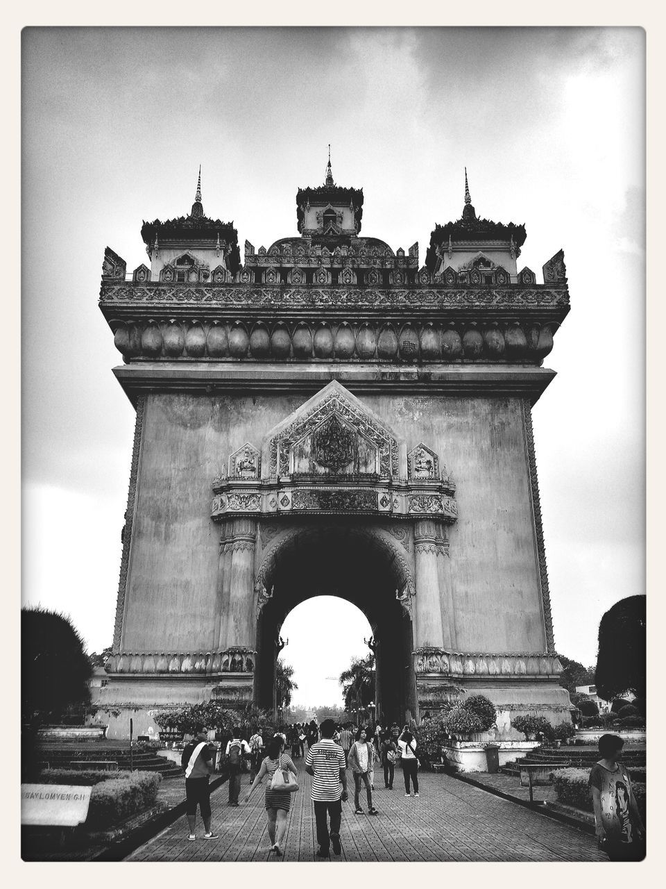 architecture, built structure, famous place, history, building exterior, travel destinations, tourism, international landmark, travel, arch, transfer print, sky, large group of people, tourist, capital cities, auto post production filter, men, low angle view, architectural column