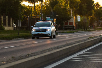 Cars on road in city