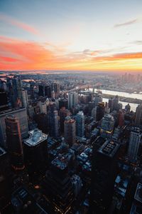 Aerial view of city at sunset