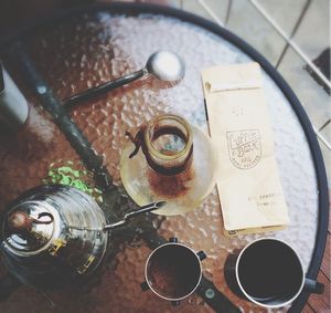 High angle view of coffee cup on table