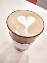 Close-up of coffee cup on table