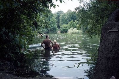 People standing in lake