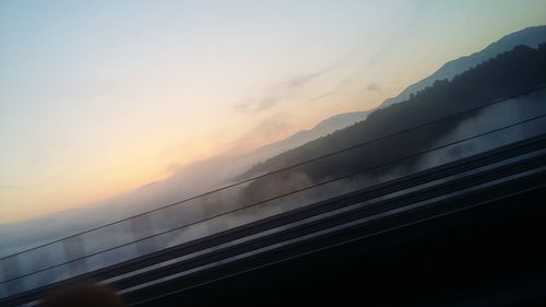 Close-up of road against sky during sunset