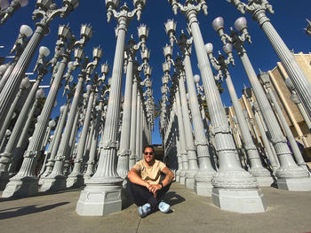 Young man sitting outdoors