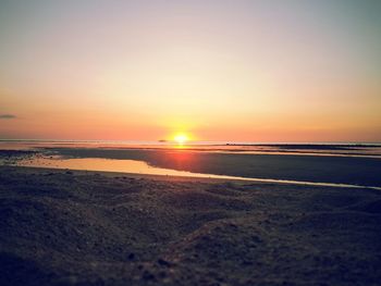 Scenic view of beach during sunset