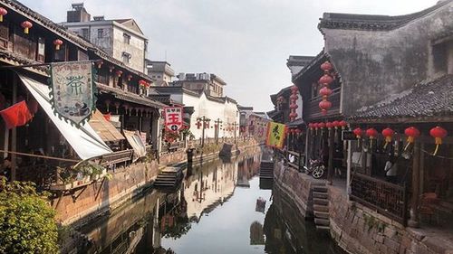 View of canal along buildings