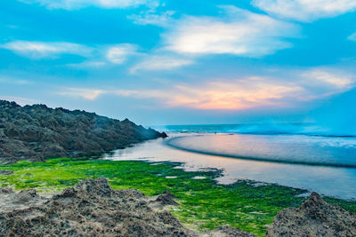 Scenic view of sea against sky during sunset