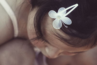 Close-up of girl wearing hair clip