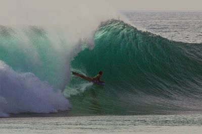 Man surfing in sea