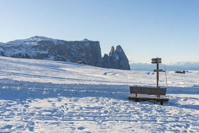 Scenic view of snowcapped mountains against clear sky