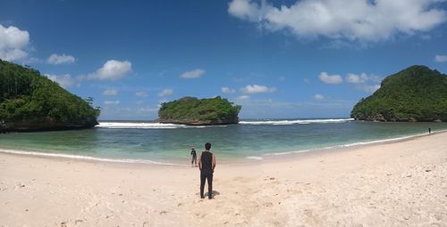 Scenic view of beach against sky