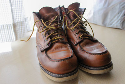 Close-up of shoes on table