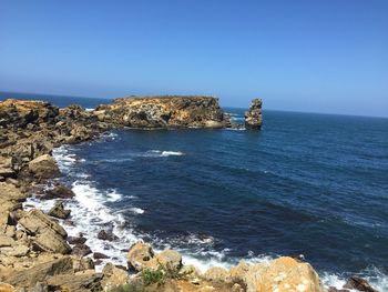 Scenic view of sea against clear sky