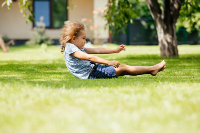 Girl lying on grass