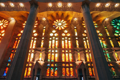 Low angle view of illuminated ceiling of building