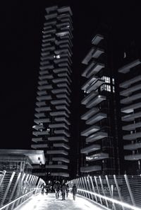 Illuminated buildings in city at night