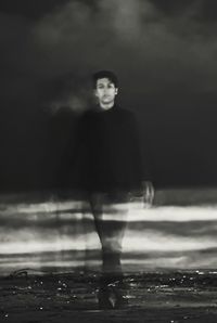 Woman standing in water