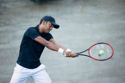 Man playing tennis