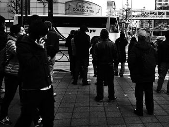 People walking on street in city