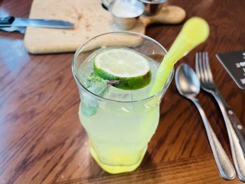 High angle view of drink in glass on table