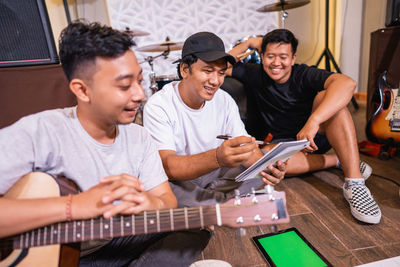 Young man playing guitar