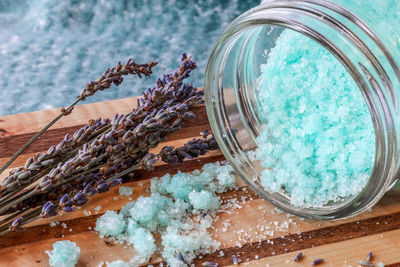 High angle view of glass jar on table