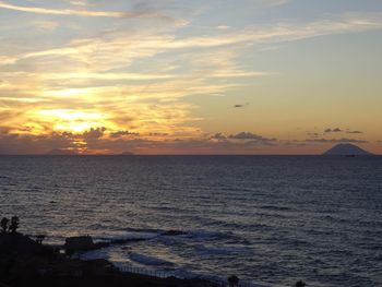 Scenic view of sea against sky during sunset