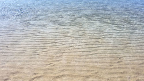 High angle view of sand on beach