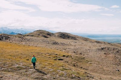 Person walking on landscape