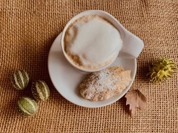 High angle view of cappuccino on table