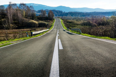 Surface level of road against mountain range