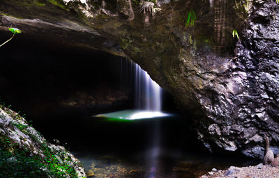 View of waterfall in cave
